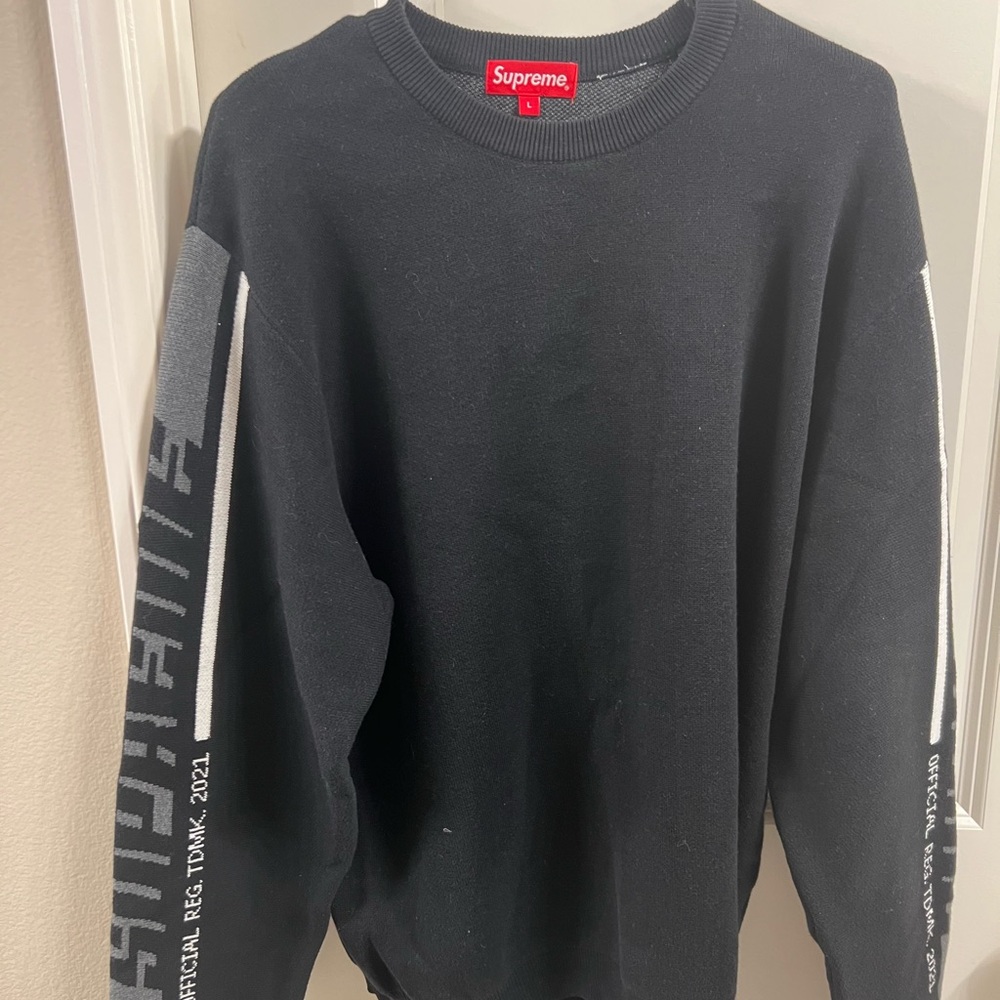 Supreme Black Crewneck Sweater with White Sleeve Text